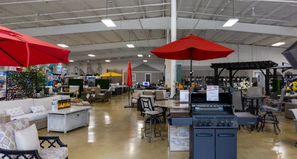 Cincinnati Pool and Patio showroom displaying outdoor furniture, umbrellas, and grills