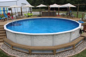 Above ground pool with wooden deck and patio furniture in backyard setting