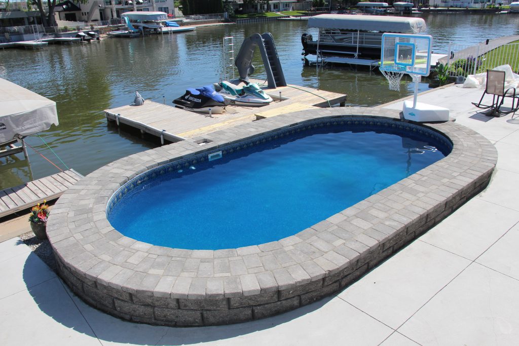 Semi-inground pool installed in a Cincinnati backyard