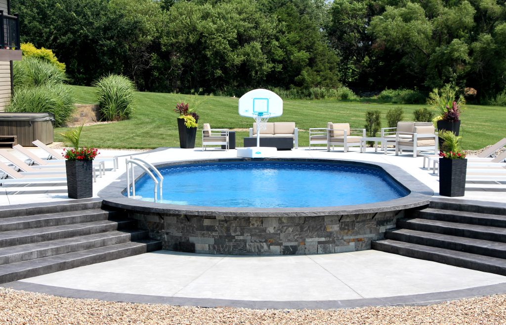 Finished semi-inground pool by Cincinnati Pool and Patio