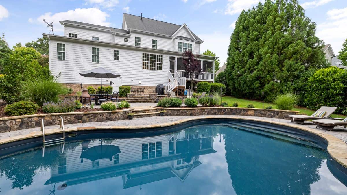 Inground pool in a Cincinnati backyard built to local permit and setback requirements